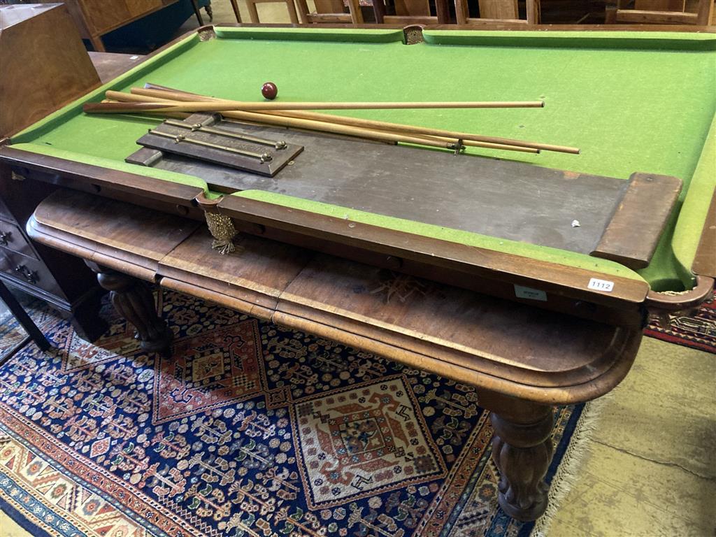 A billiard / dining table, width 183cm, depth 92cm, scoreboard, cues, bridge stick and three balls